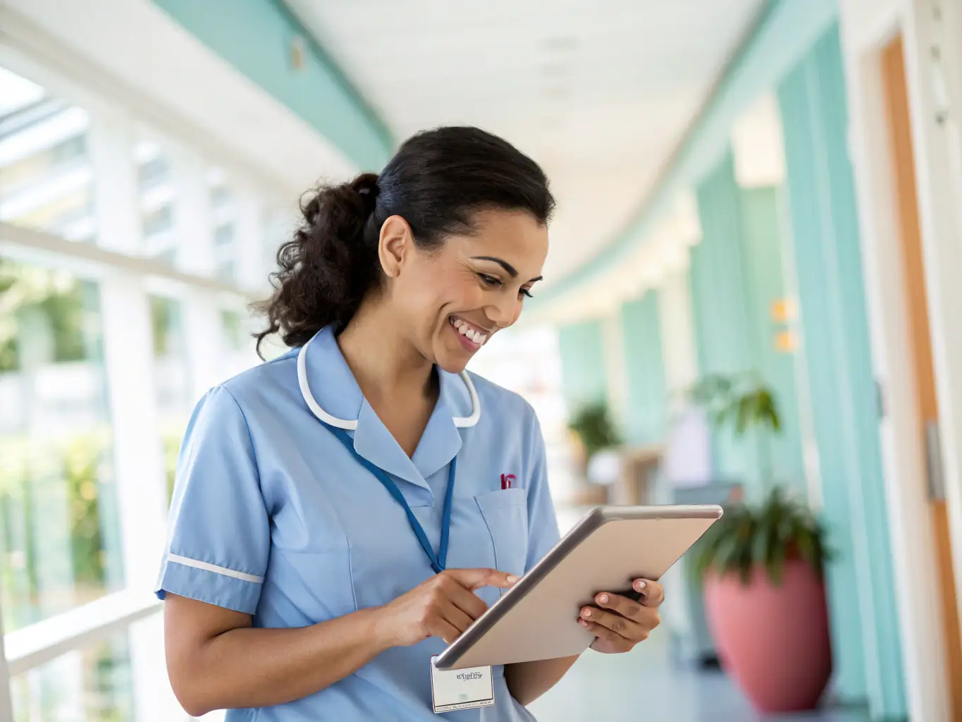 A nurse engaging with a patient via telehealth platform on a tablet, illustrating the personalized care and support offered during nurse consultations.